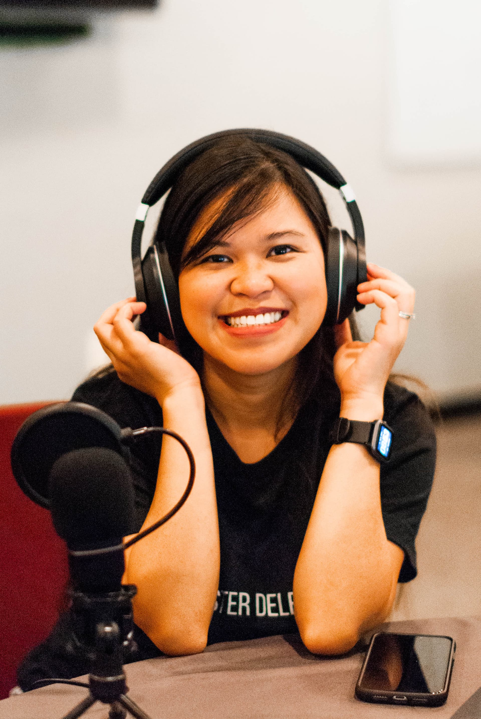 Kristy Yoder recording The Lazy Entrepreneur Podcast
